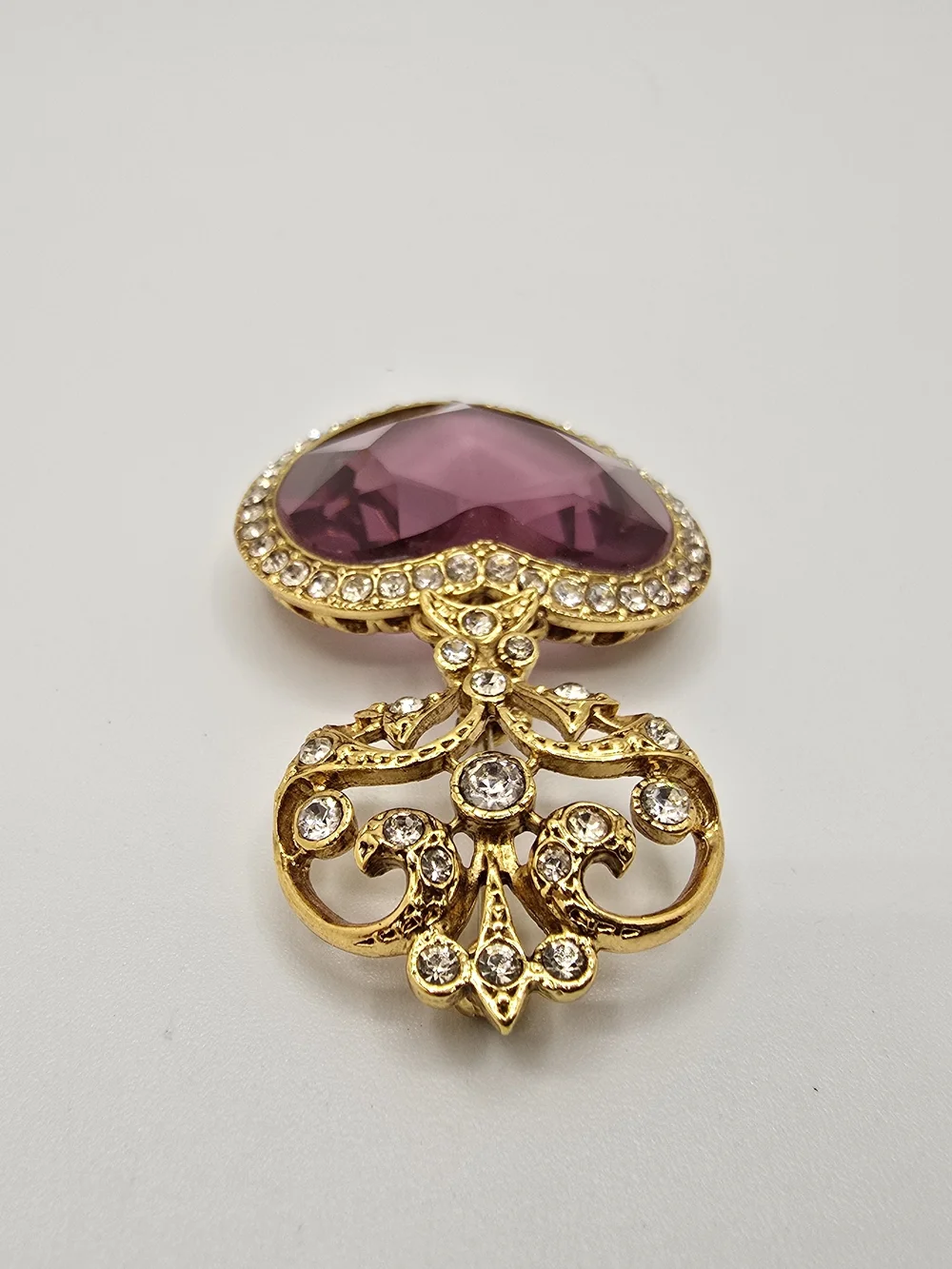 Vintage Purple Crystal Heart Brooch Rhinestone Gold Tone Articulated 2.25